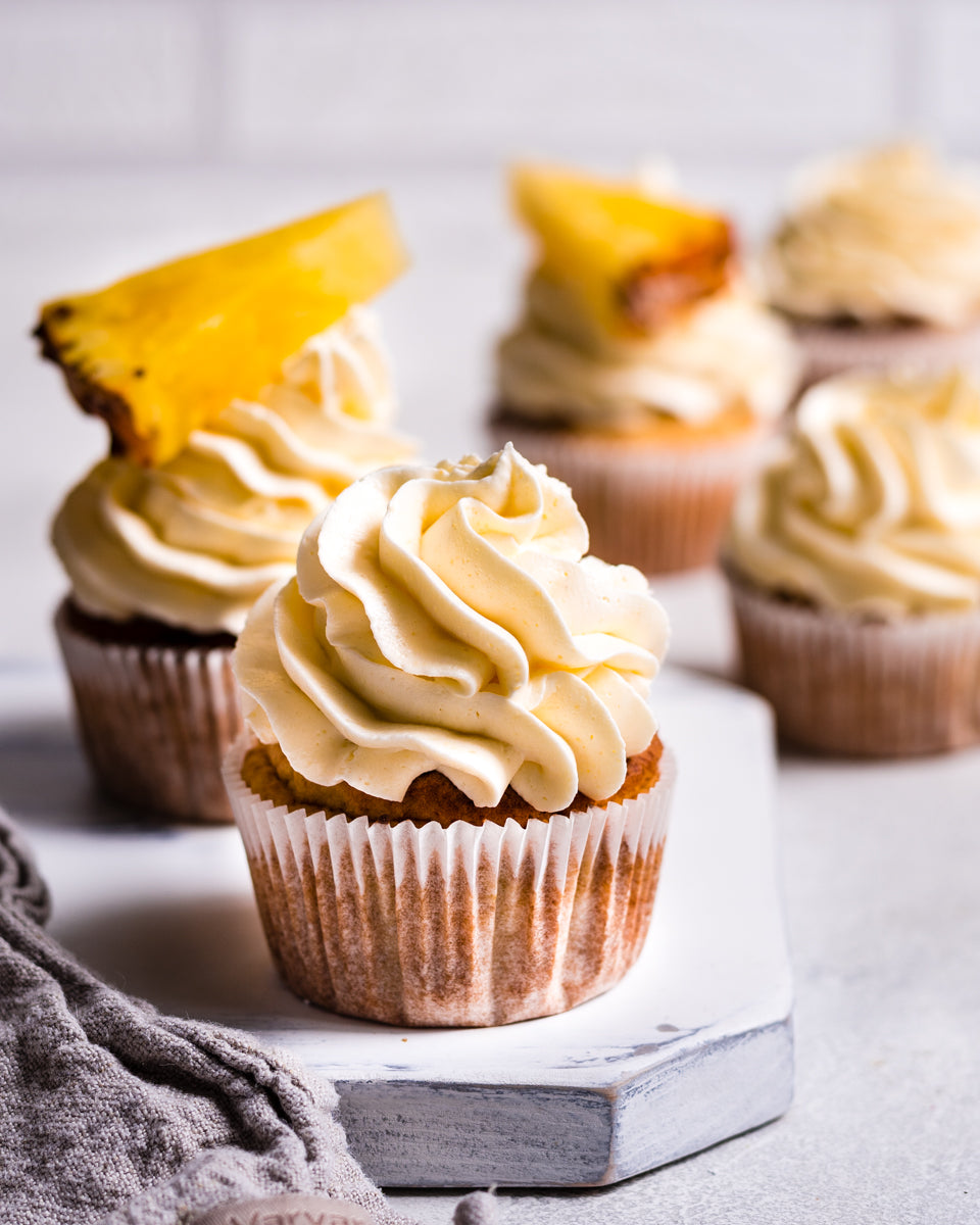 Cupcakes auf einem FoodyBoard Fotohintergrund 