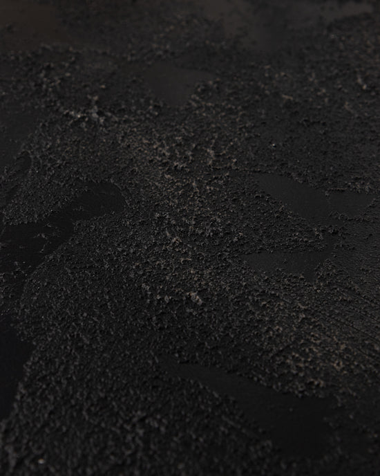 Fotohintergrund in schwarz mit fühlbarer 3D-Struktur
